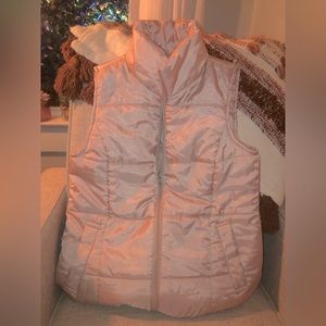 Light pink size medium puffer vest, women’s